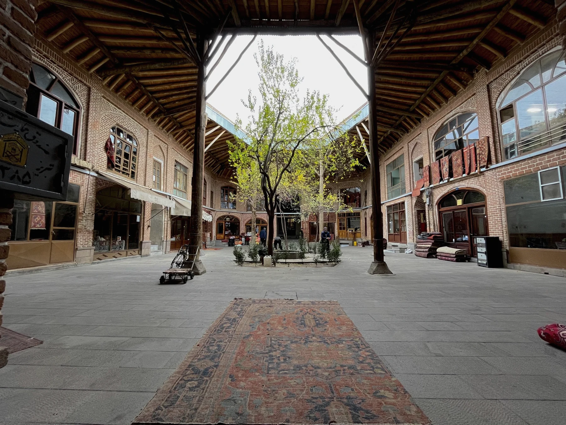 Historic brick courtyard with central garden